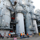 Workers at the troubled carbon capture plant in DeKalb, Mississippi in November, 2015. Photo: Rogelio V. Solis/AP